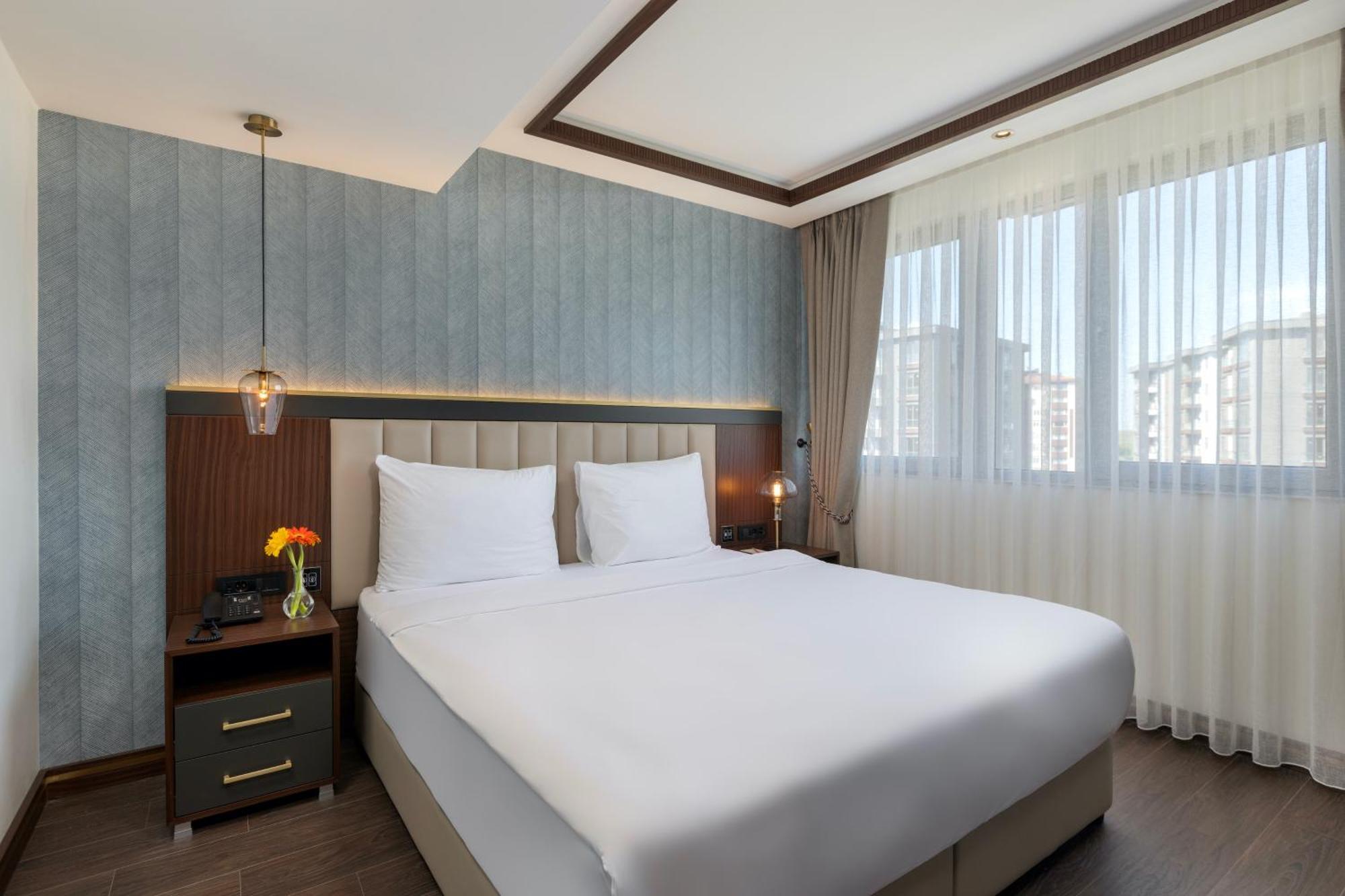 Miracle Istanbul Asia Airport Hotel & Spa Eksteriør billede A bedroom at the hotel